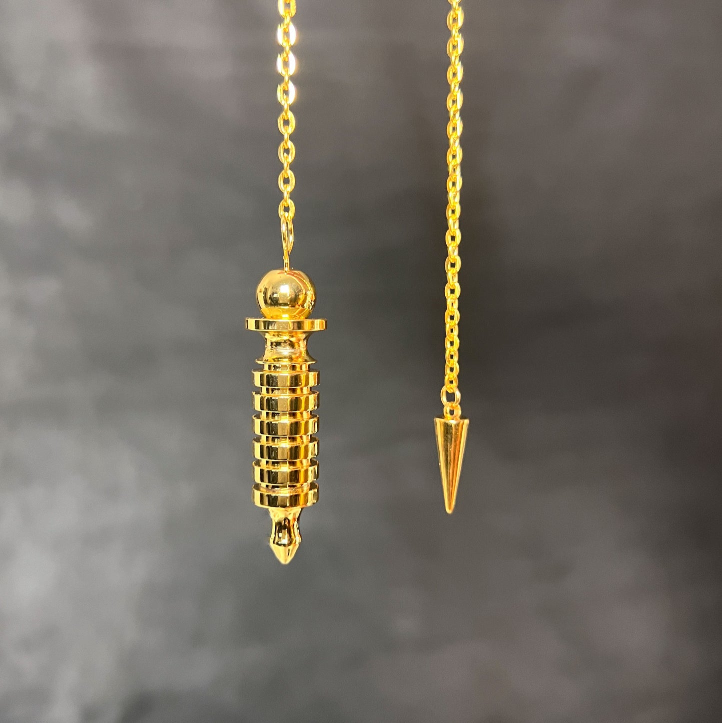 Golden Egyptian Isis dowsing pendulum with a chamber Baguette Magick