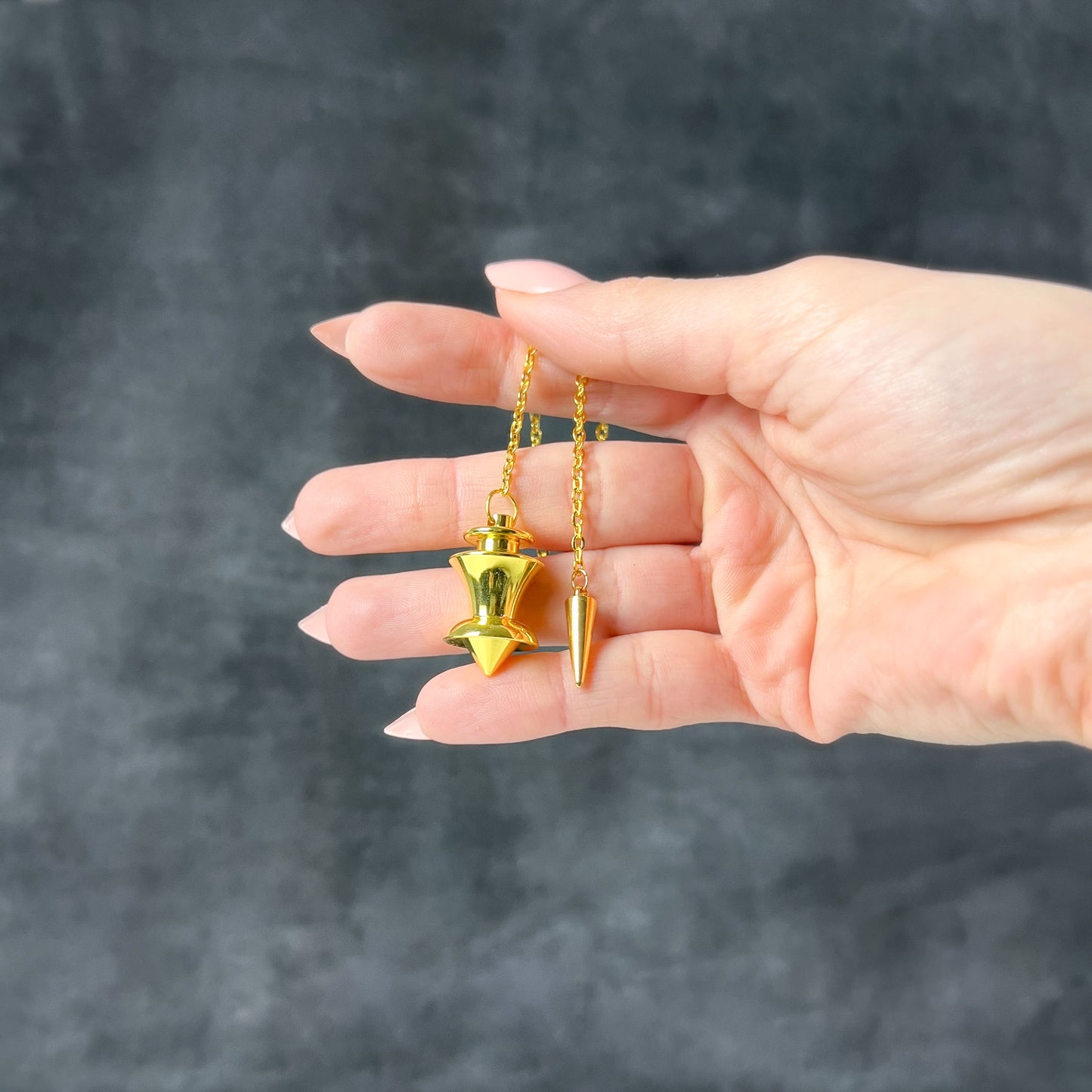 Golden point and dome dowsing metal pendulum with a spike charm Baguette Magick