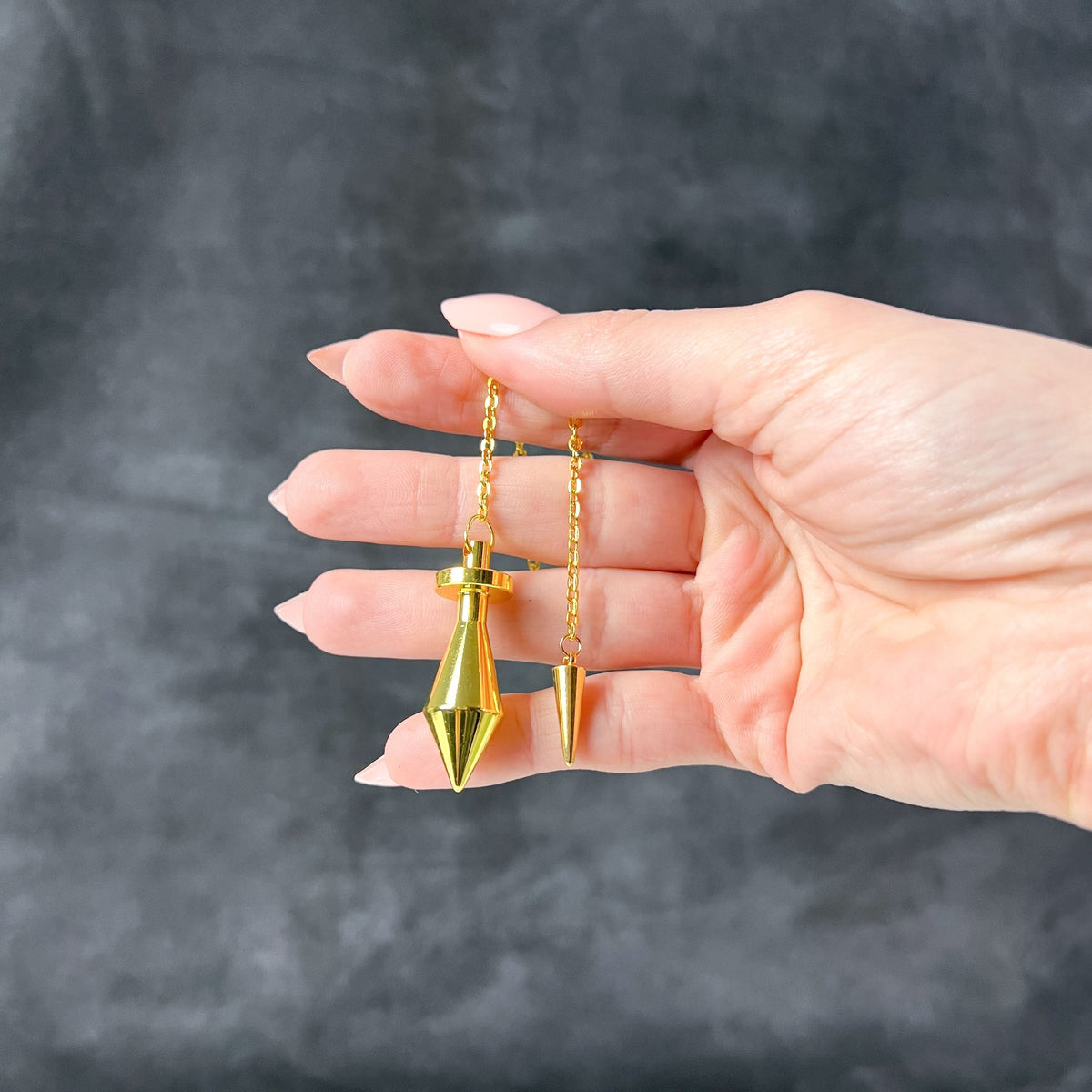 Golden long point dowsing metal pendulum with a spike charm Baguette Magick