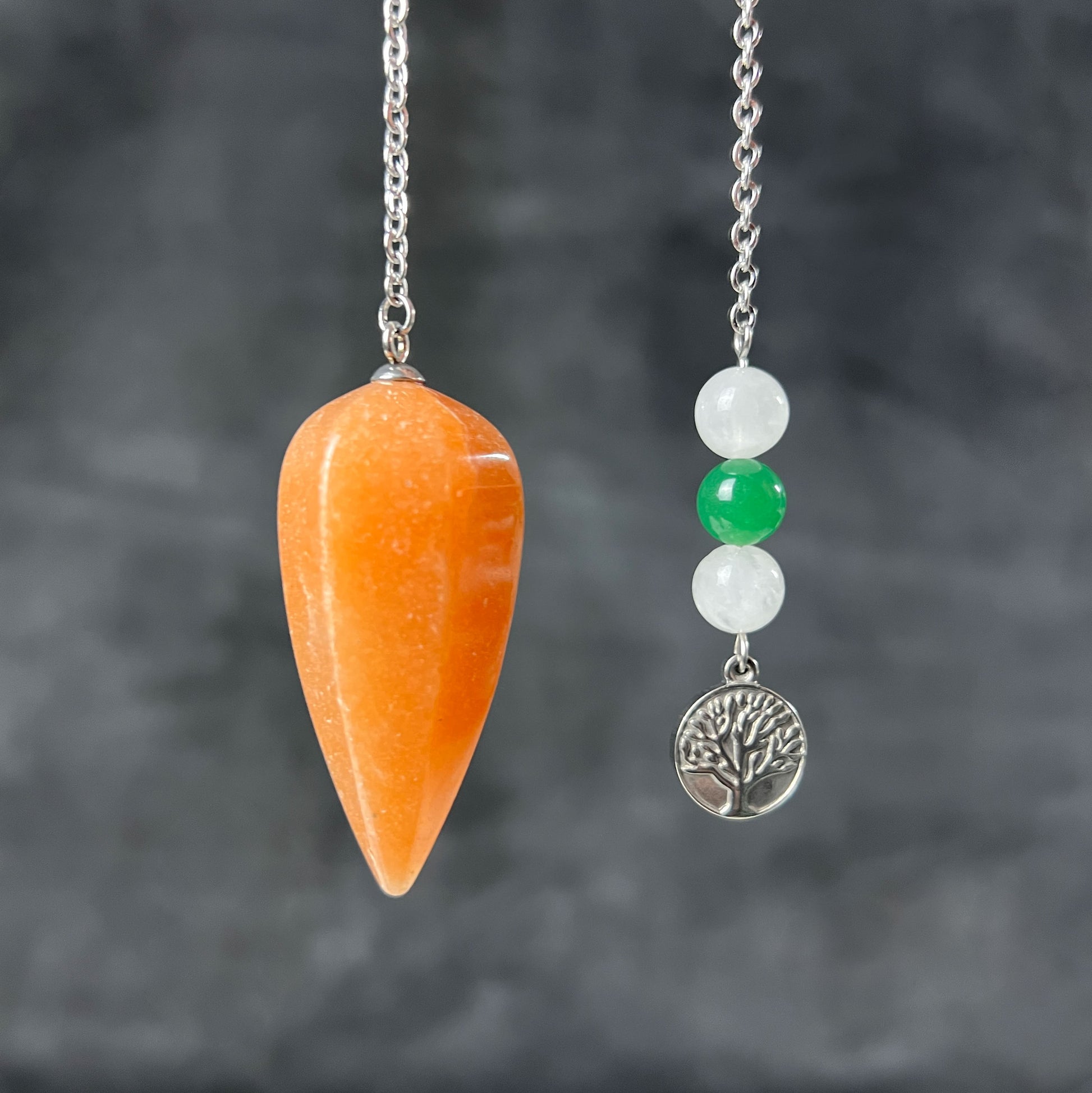 Orange and green aventurine, clear quartz, and tree of life stainless steel pendulum Baguette Magick