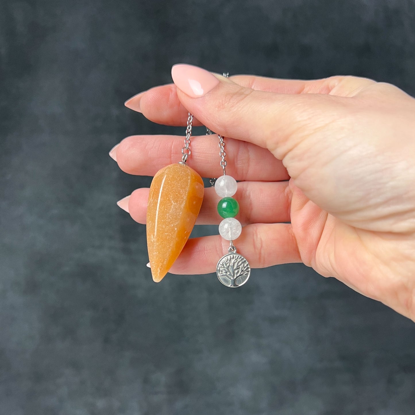 Orange and green aventurine, clear quartz, and tree of life stainless steel pendulum Baguette Magick