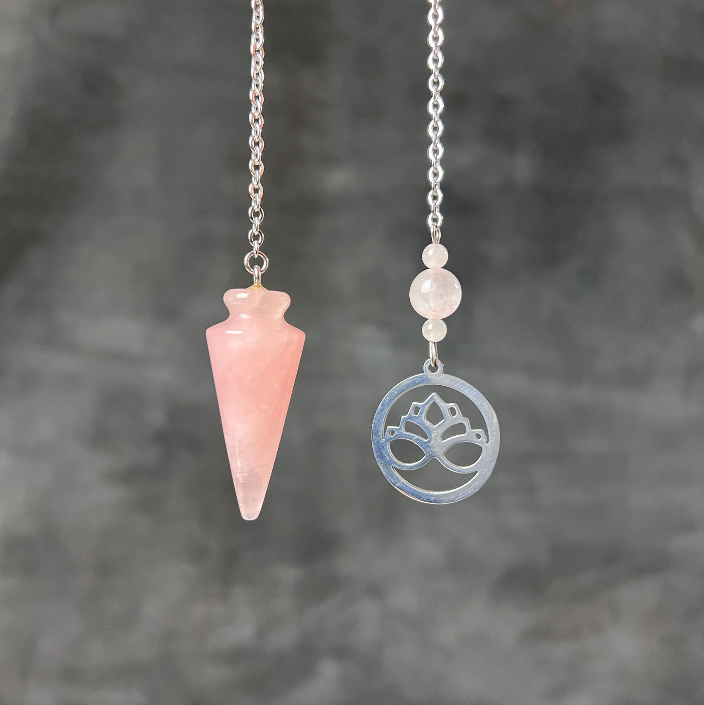 Rose quartz and stainless steel lotus flower pendulum Baguette Magick