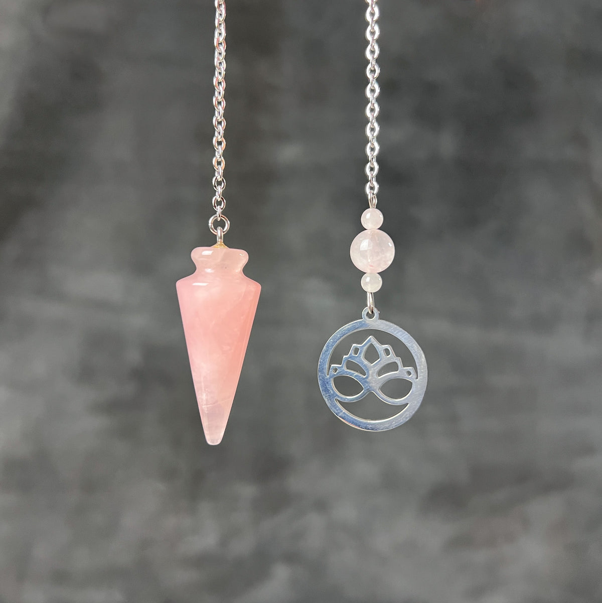 Rose quartz and stainless steel lotus flower pendulum Baguette Magick