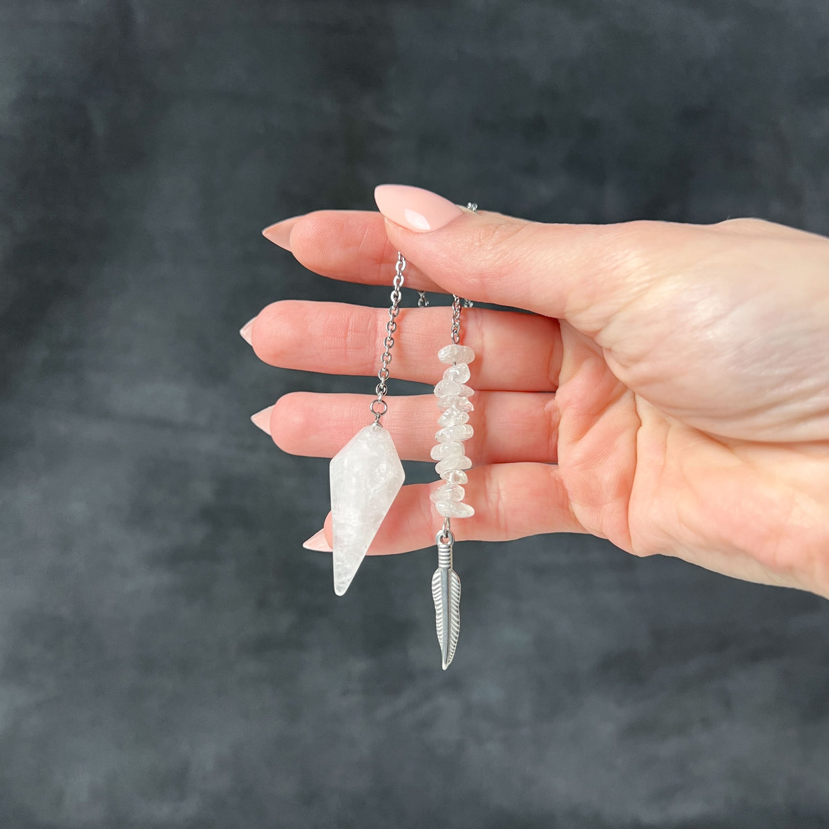 Stainless steel clear quartz and feather pendulum Baguette Magick