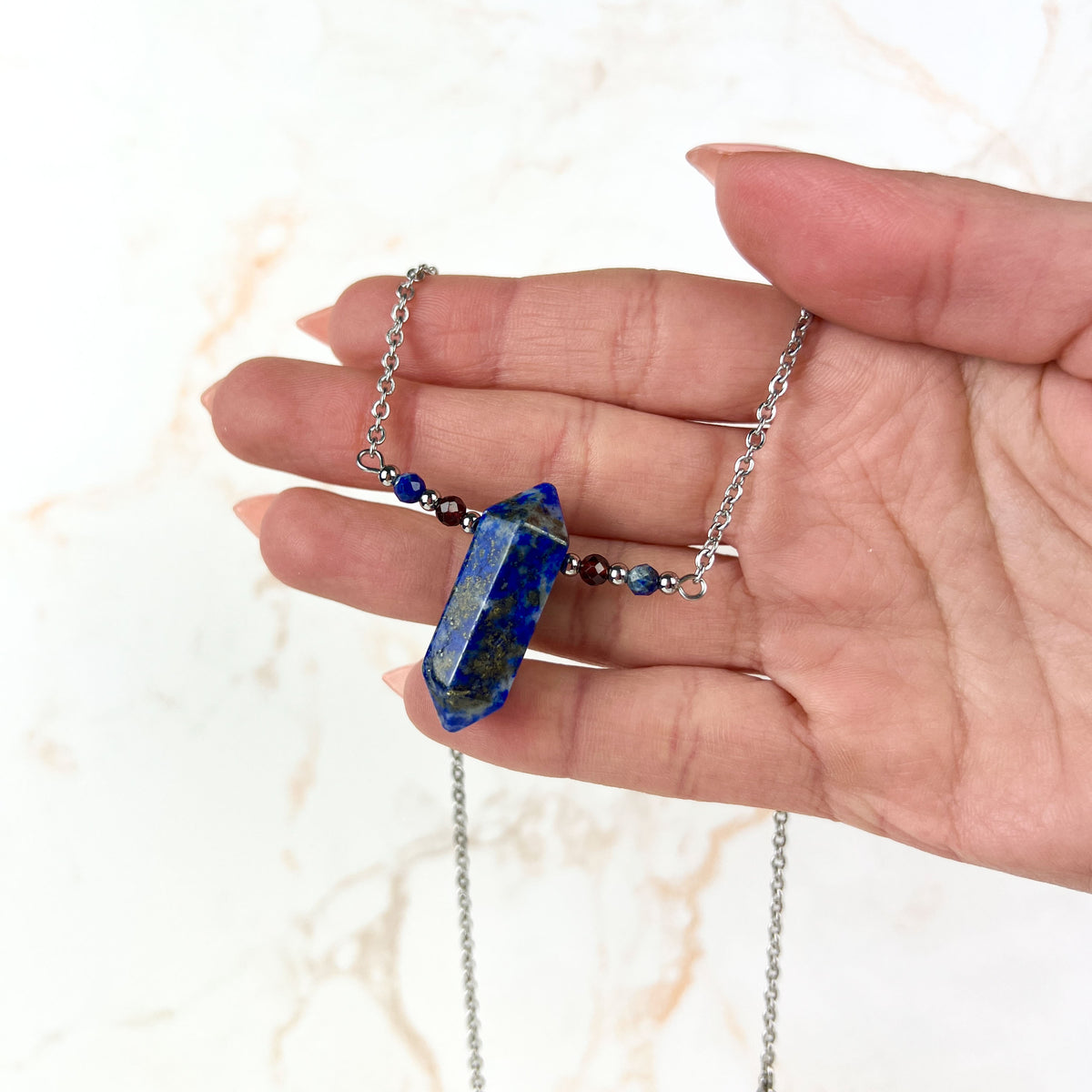 Lapis lazuli, garnet and stainless steel necklace with faceted beads Baguette Magick