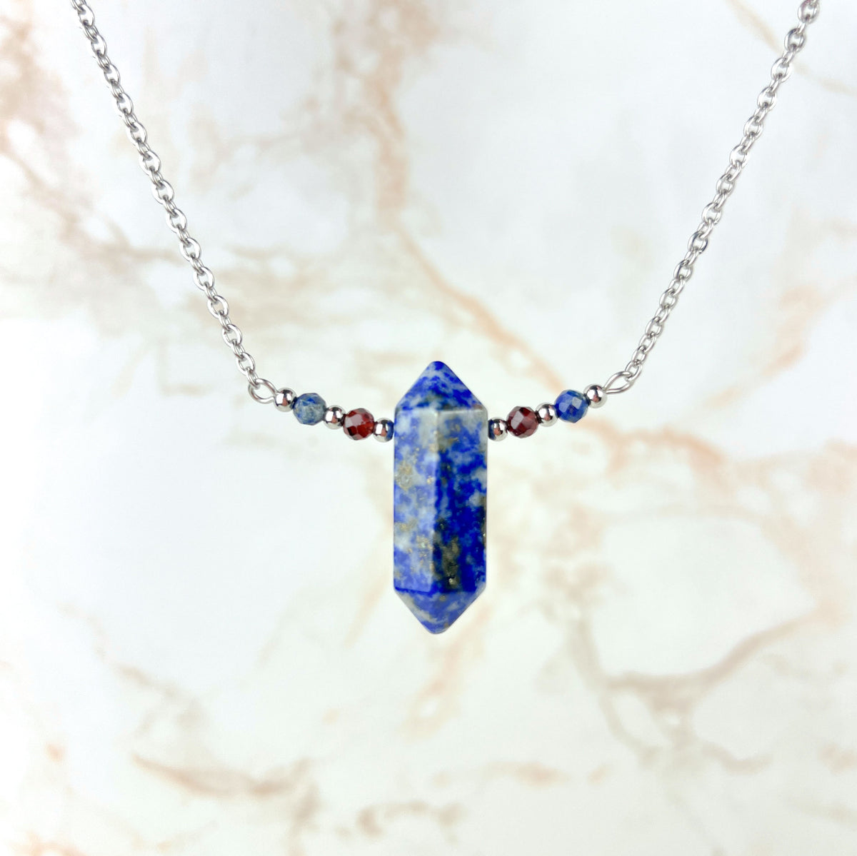 Lapis lazuli, garnet and stainless steel necklace with faceted beads Baguette Magick