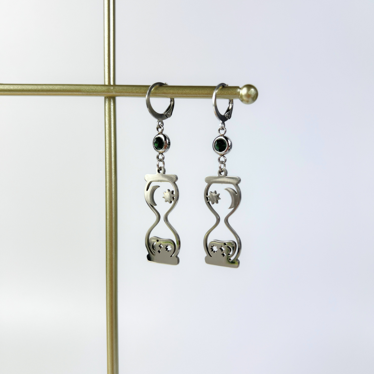 Celestial hourglass earrings with emerald green rhinestones Baguette Magick