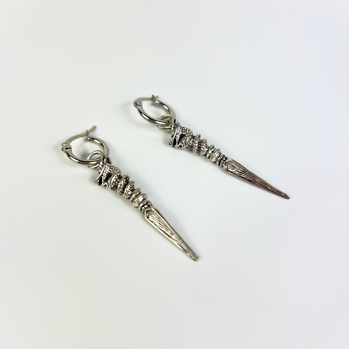 Boucles d'oreilles créoles poignards de dragon