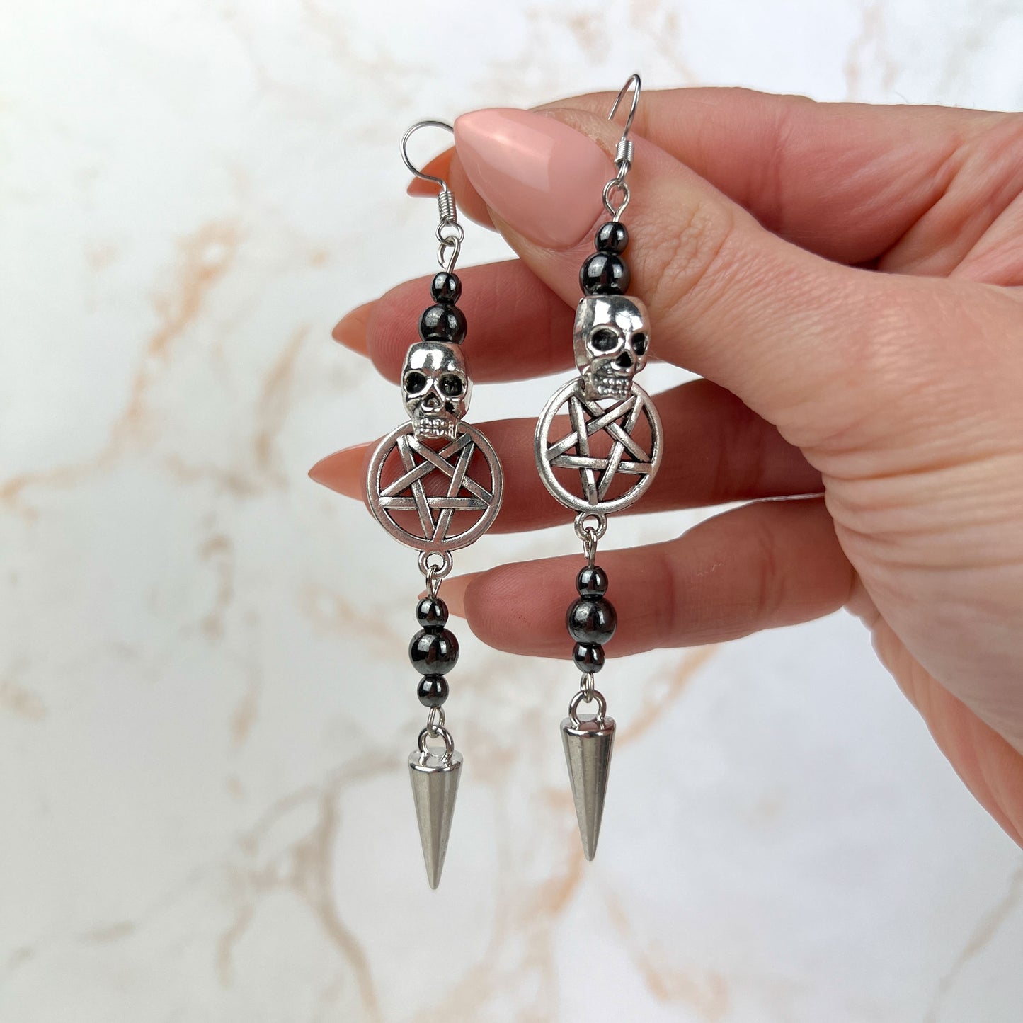 Skulls pentacles spikes and magnetic hematite earrings Baguette Magick