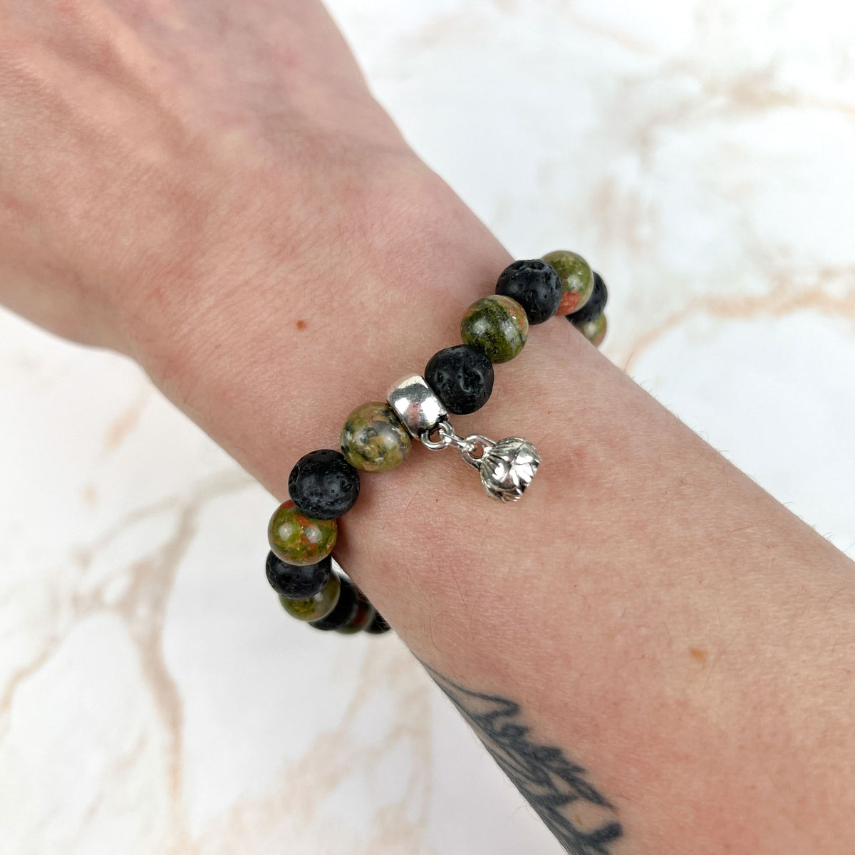 Unakite and lava mala beaded bracelet with a lotus seed charm Baguette Magick