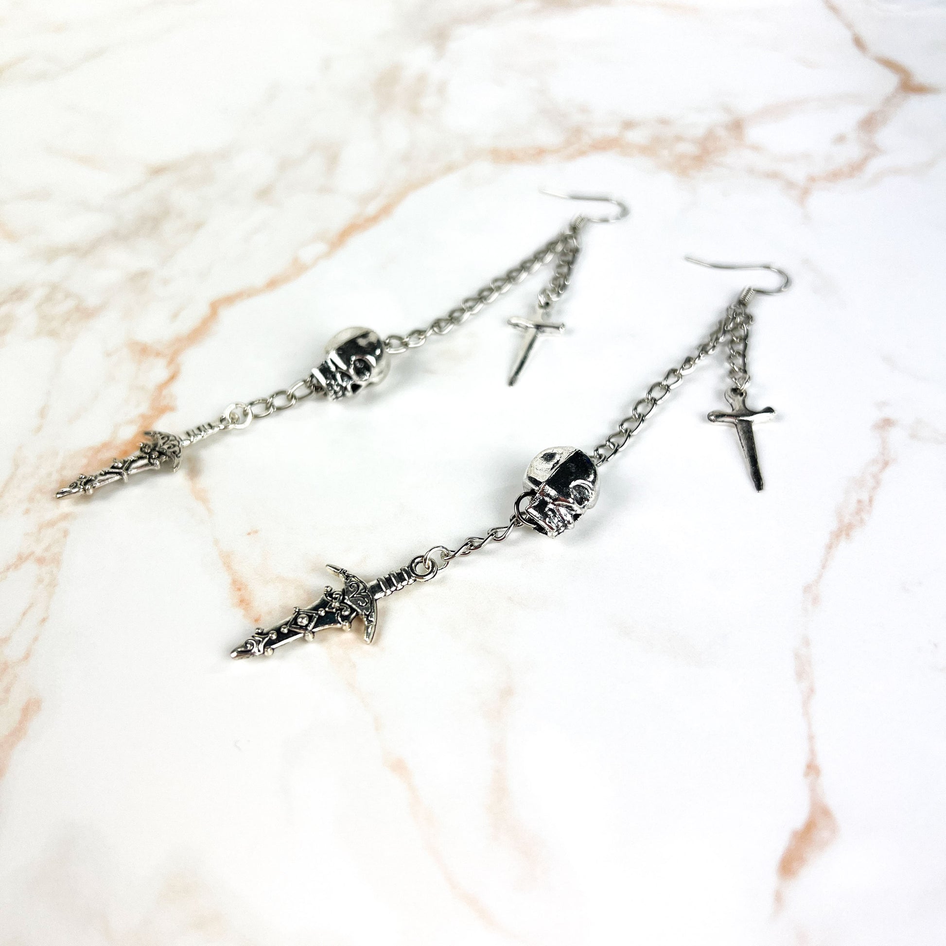 Skull and daggers dangle & drop earrings Baguette Magick