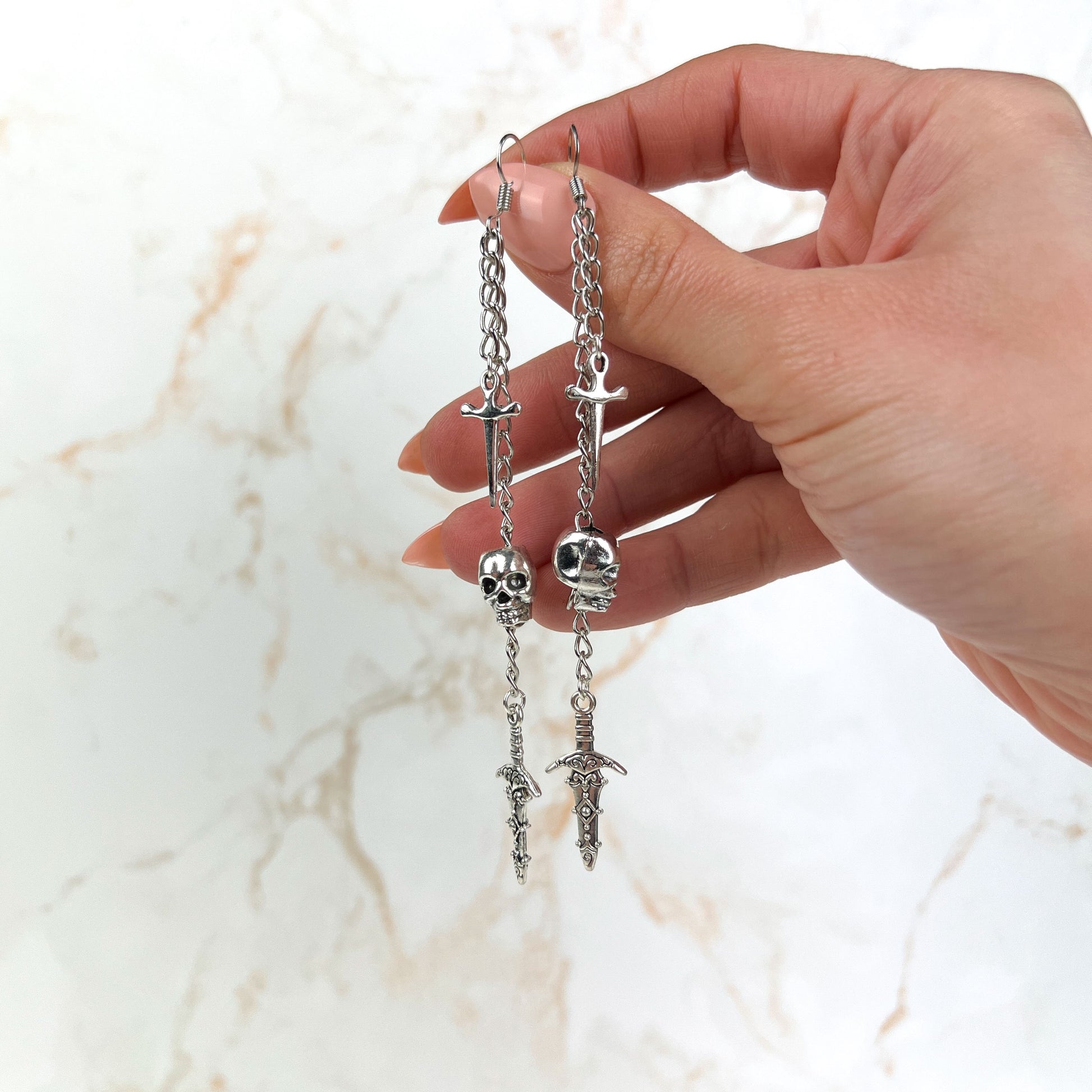 Skull and daggers dangle & drop earrings Baguette Magick