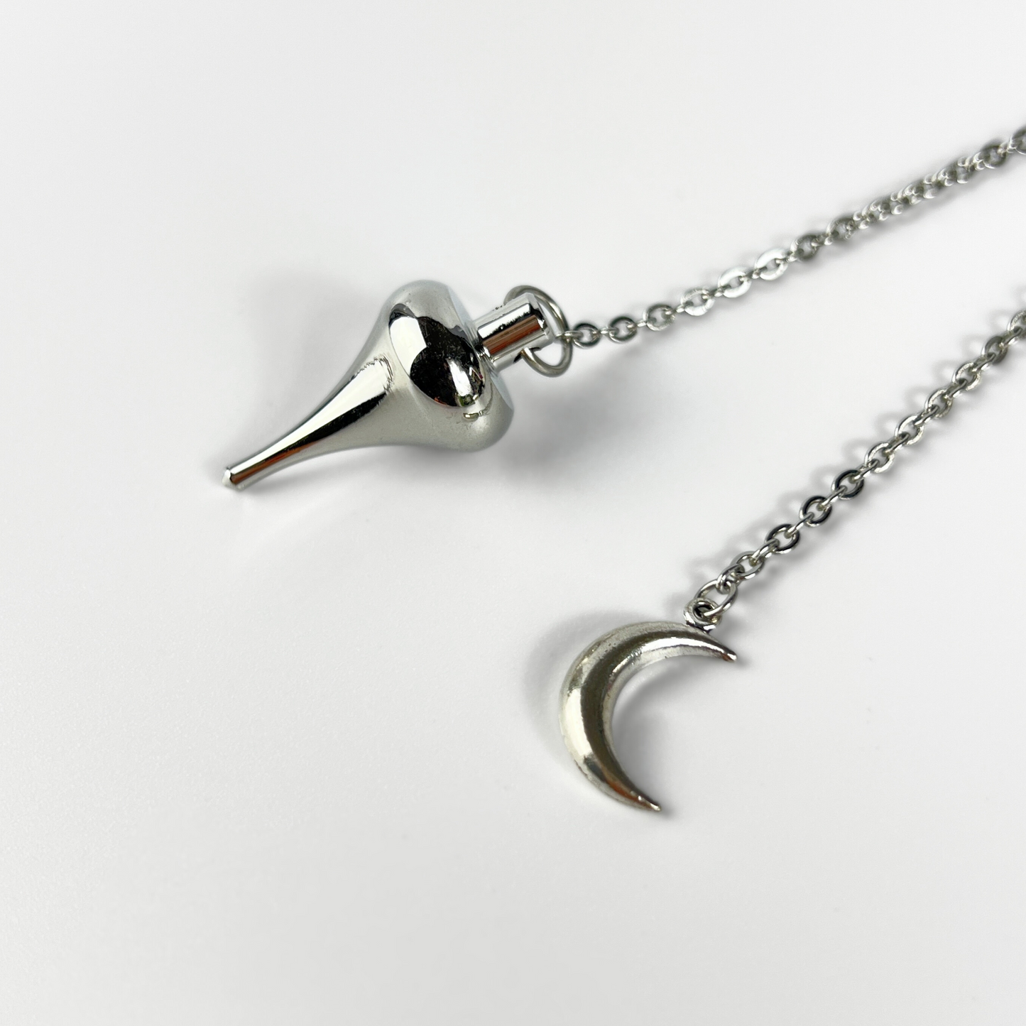 Luzi dowsing metal pendulum with a crescent Moon