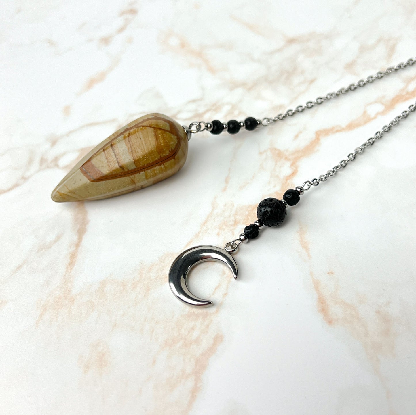 Picture jasper, lava rock and Moon crescent stainless steel pendulum Baguette Magick