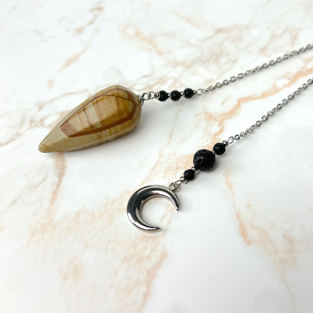 Picture jasper, lava rock and Moon crescent stainless steel pendulum Baguette Magick