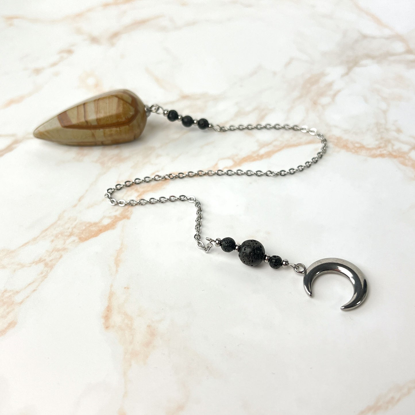 Picture jasper, lava rock and Moon crescent stainless steel pendulum Baguette Magick