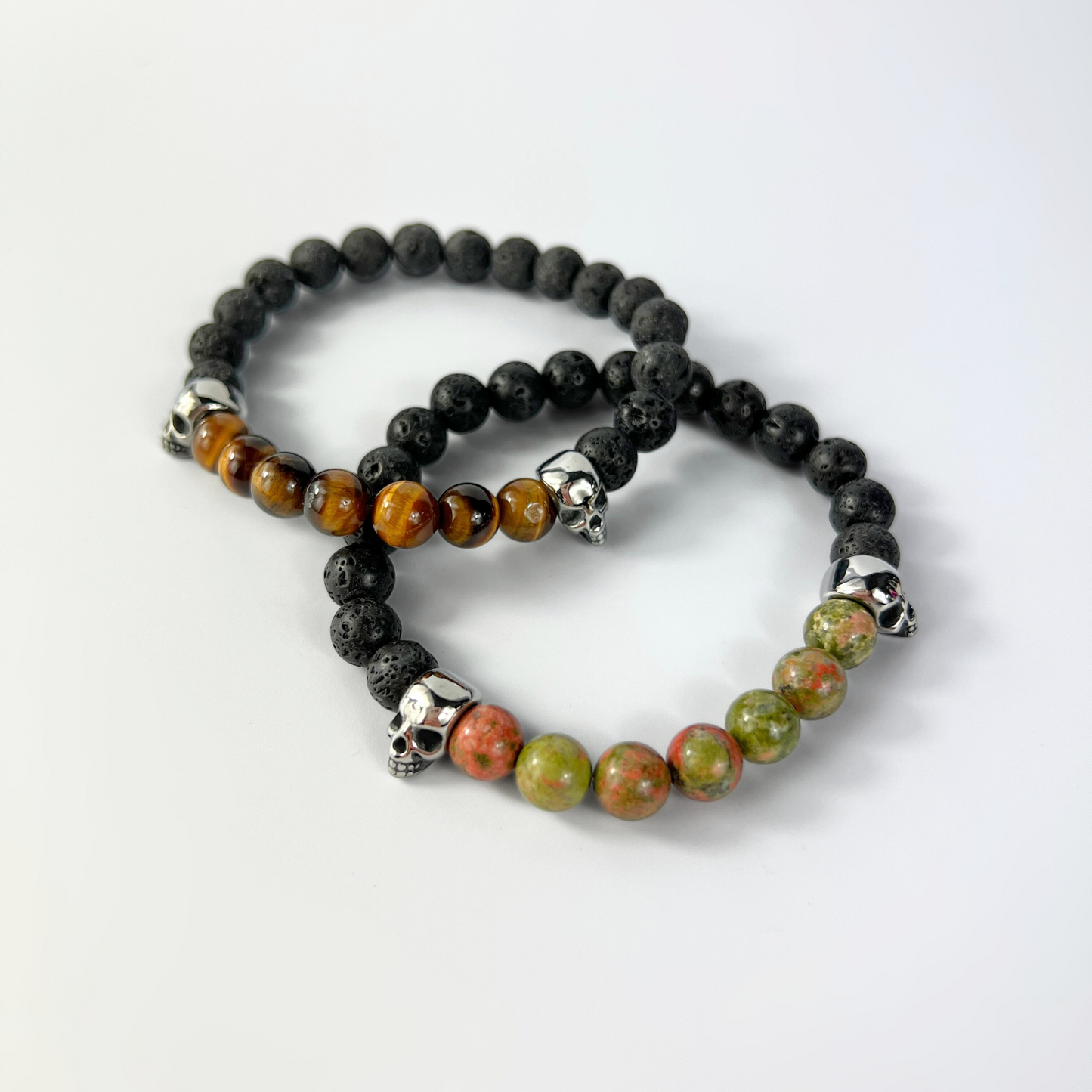 Lava rock and unakite or tiger's eye mala bracelet, with skulls