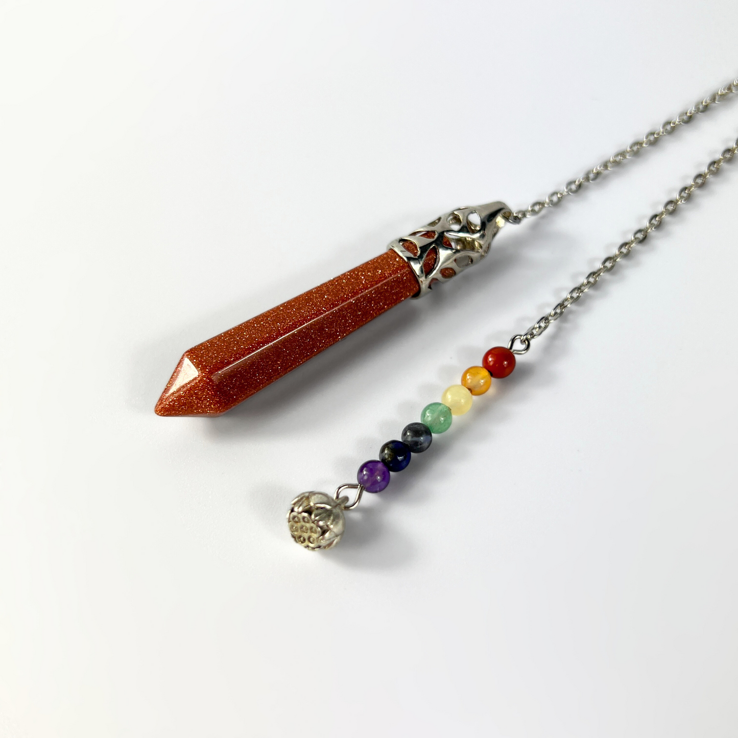 7 chakras goldstone pendulum with a lotus seed