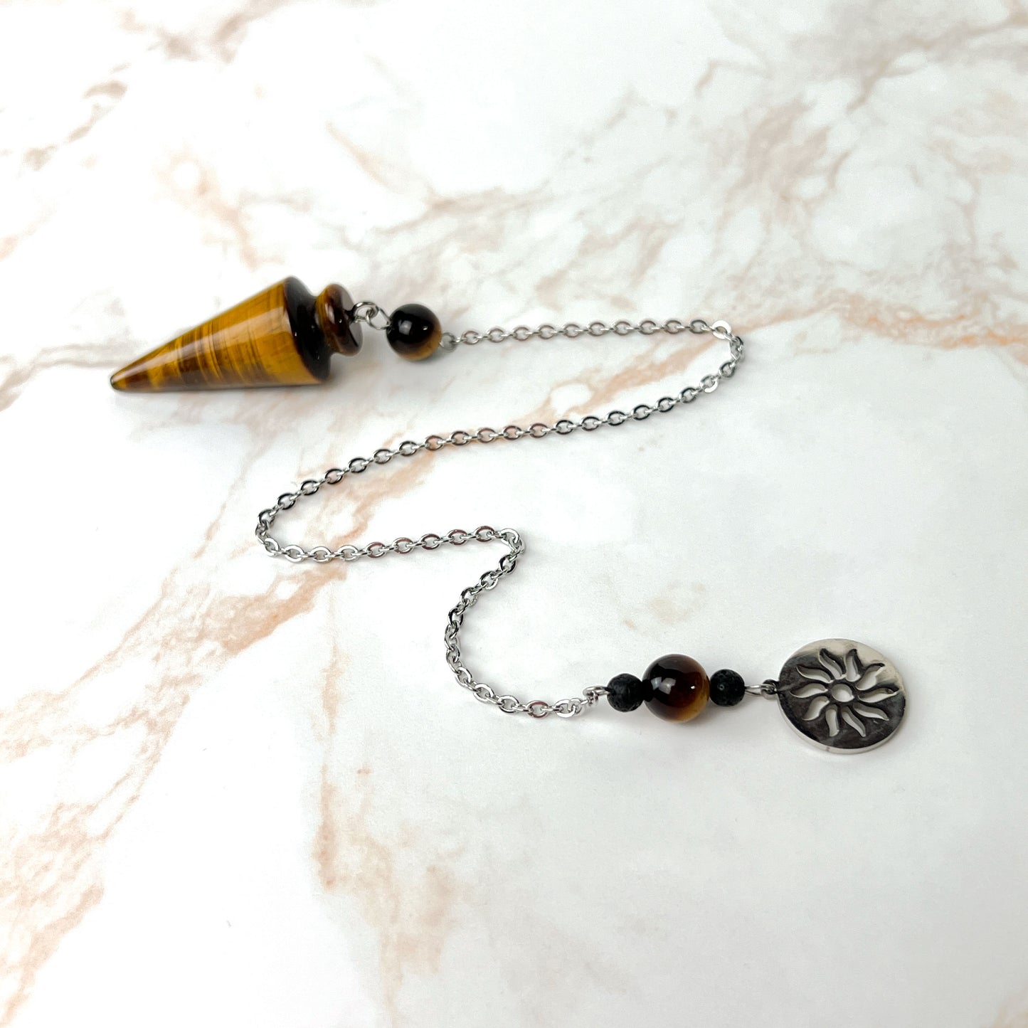 Tiger eye and stainless steel pendulum with a Sun charm Baguette Magick