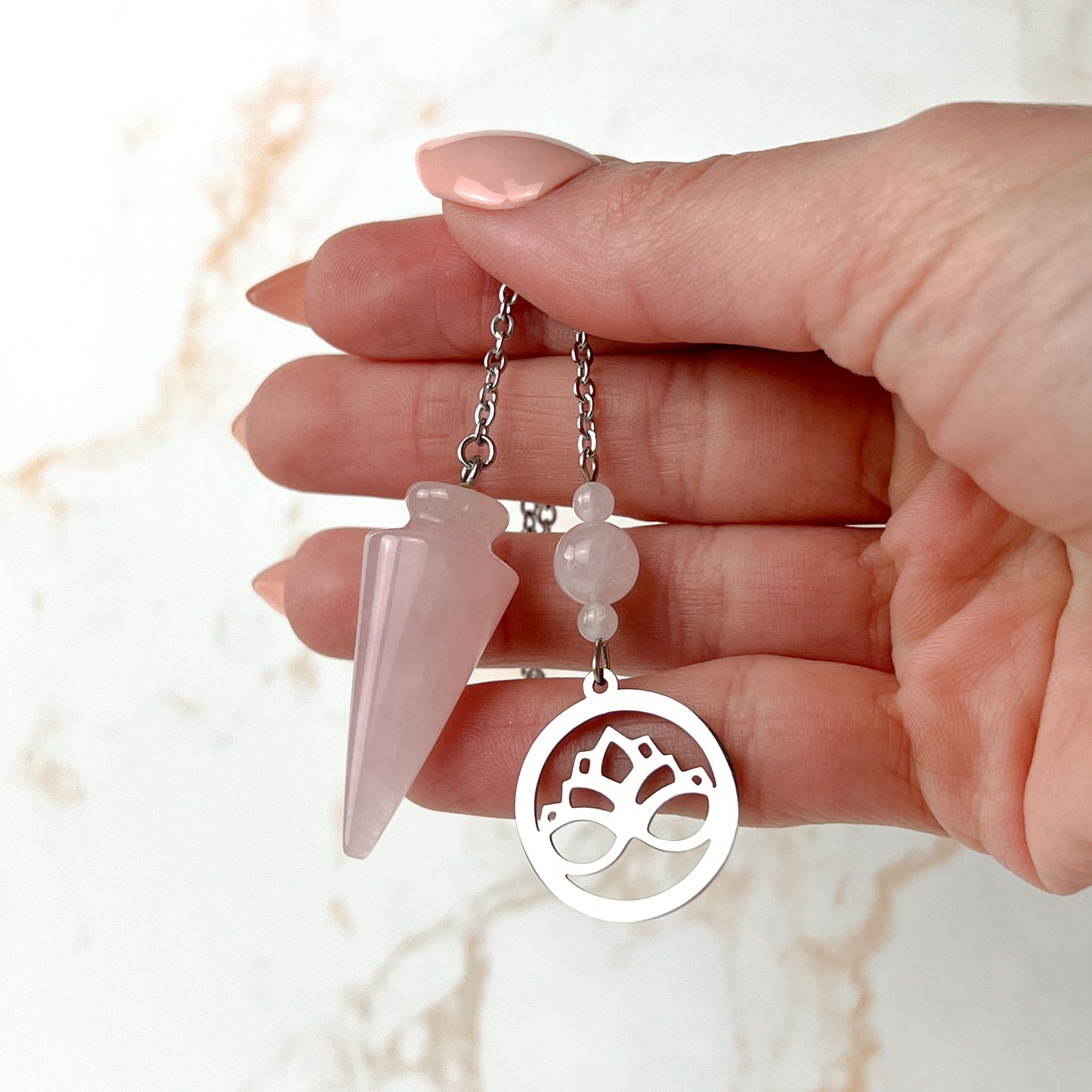 Rose quartz and stainless steel lotus flower pendulum Baguette Magick