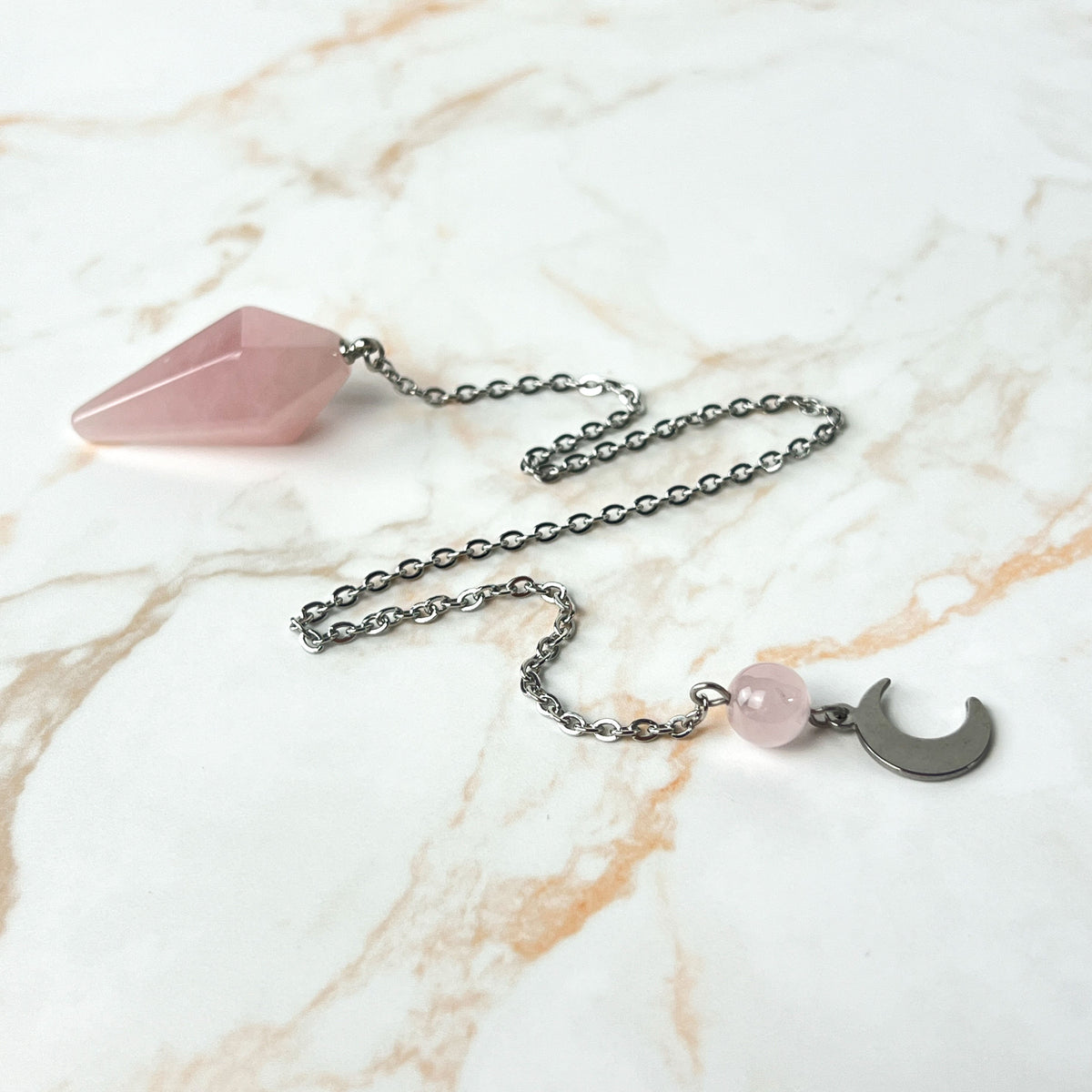 Stainless steel Rose quartz and crescent moon pendulum Baguette Magick