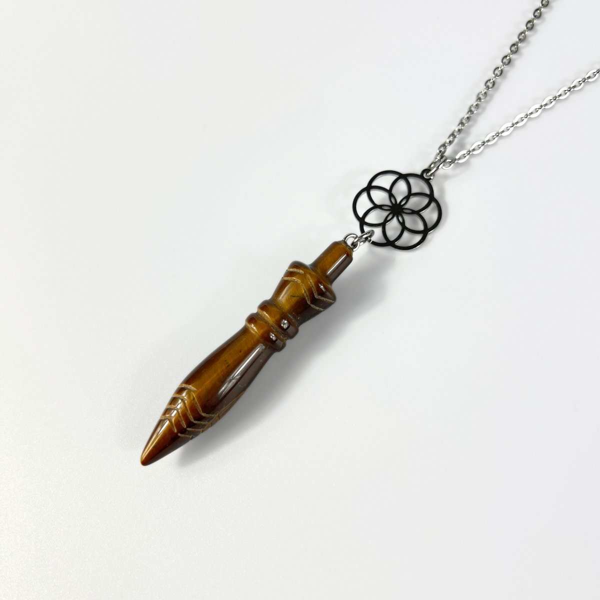 Engraved Egyptian Thot pendulum necklace, tiger's eye, flower of life