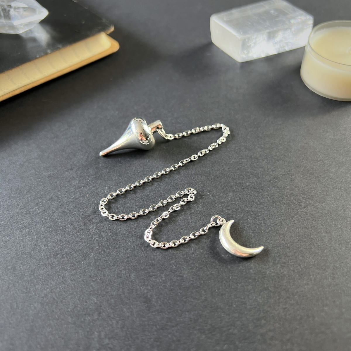 Luzi dowsing metal pendulum with a crescent Moon