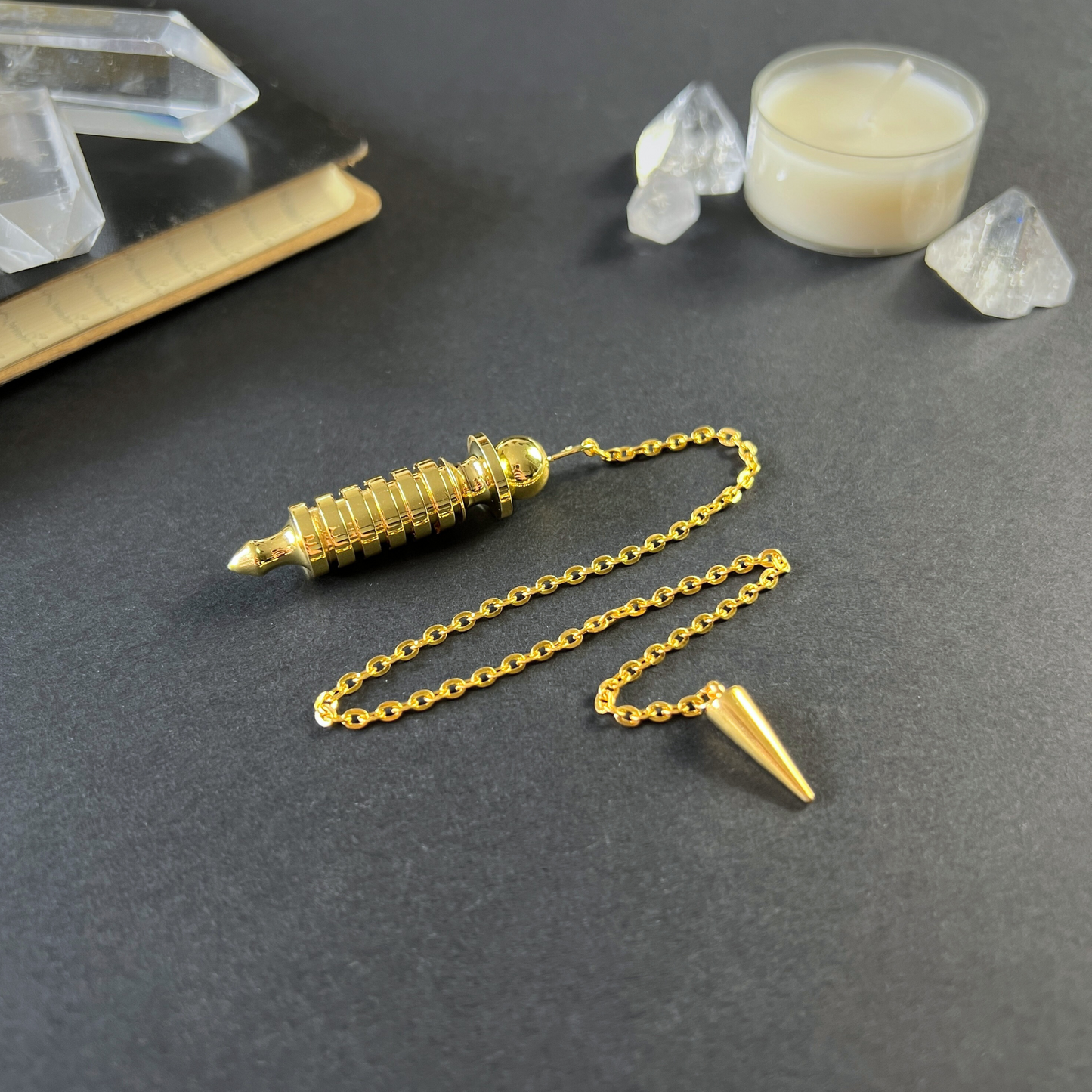 Golden Egyptian Isis dowsing pendulum with a chamber