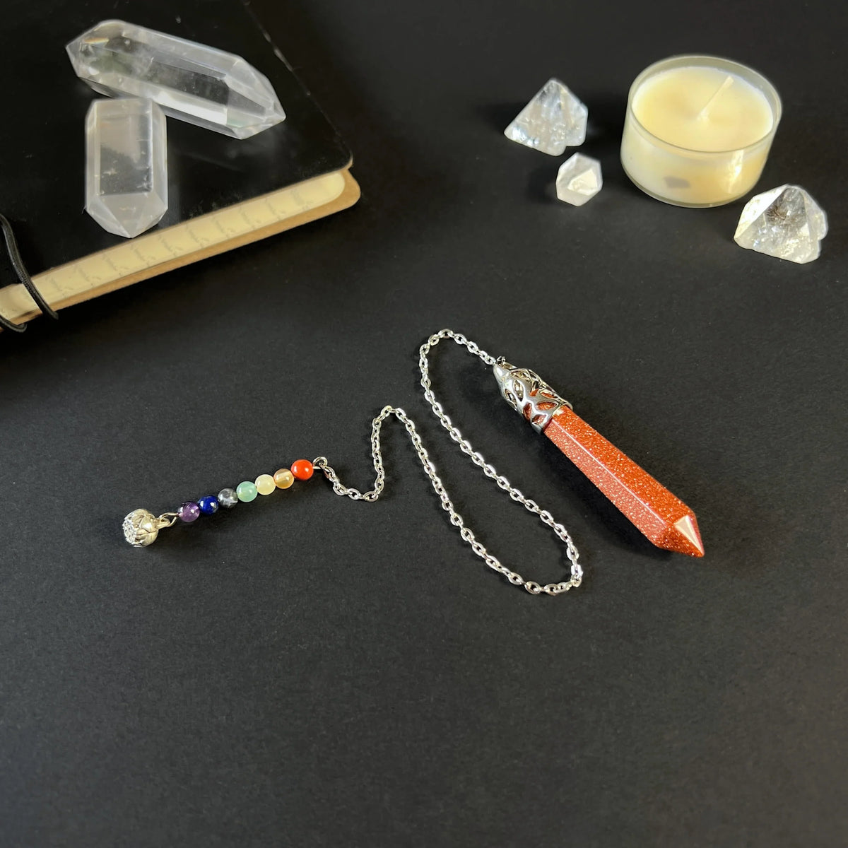 7 chakras goldstone pendulum with a lotus seed Baguette Magick