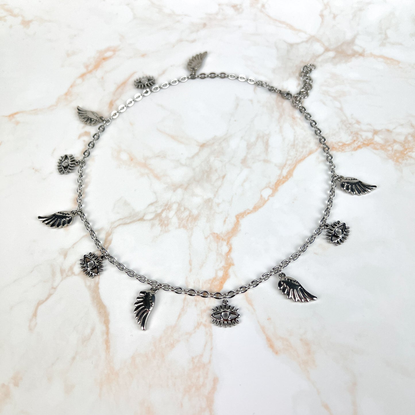 Biblical angel necklace, eyes and wings charms, made of stainless steel Baguette Magick