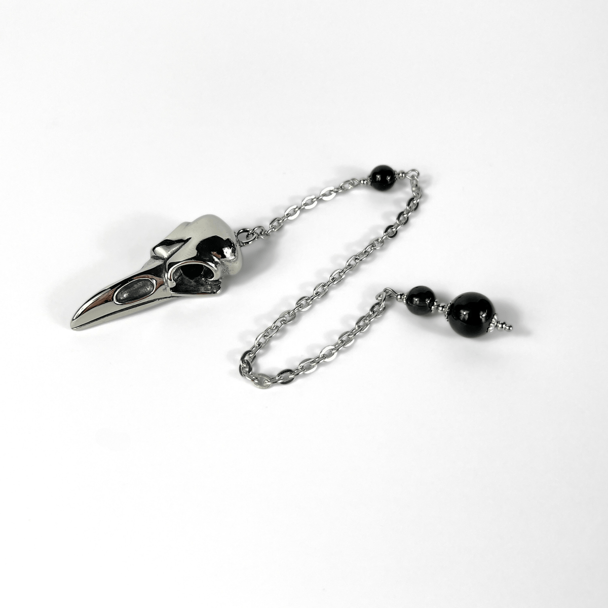Raven skull and obsidian dowsing pendulum, stainless steel Baguette Magick