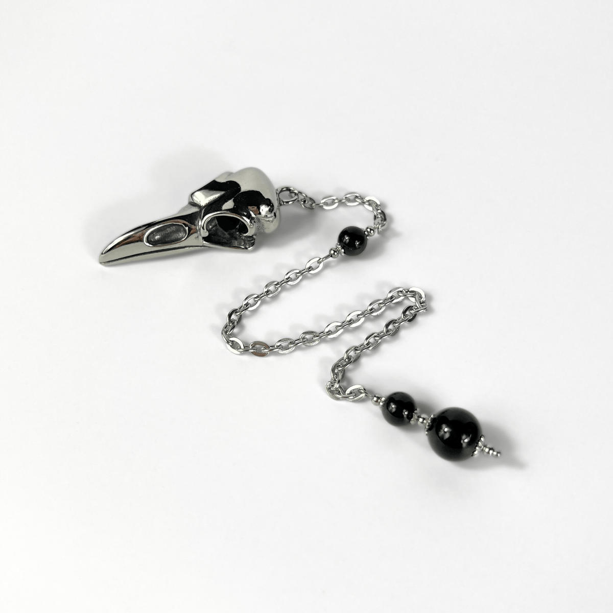 Raven skull and obsidian dowsing pendulum, stainless steel Baguette Magick