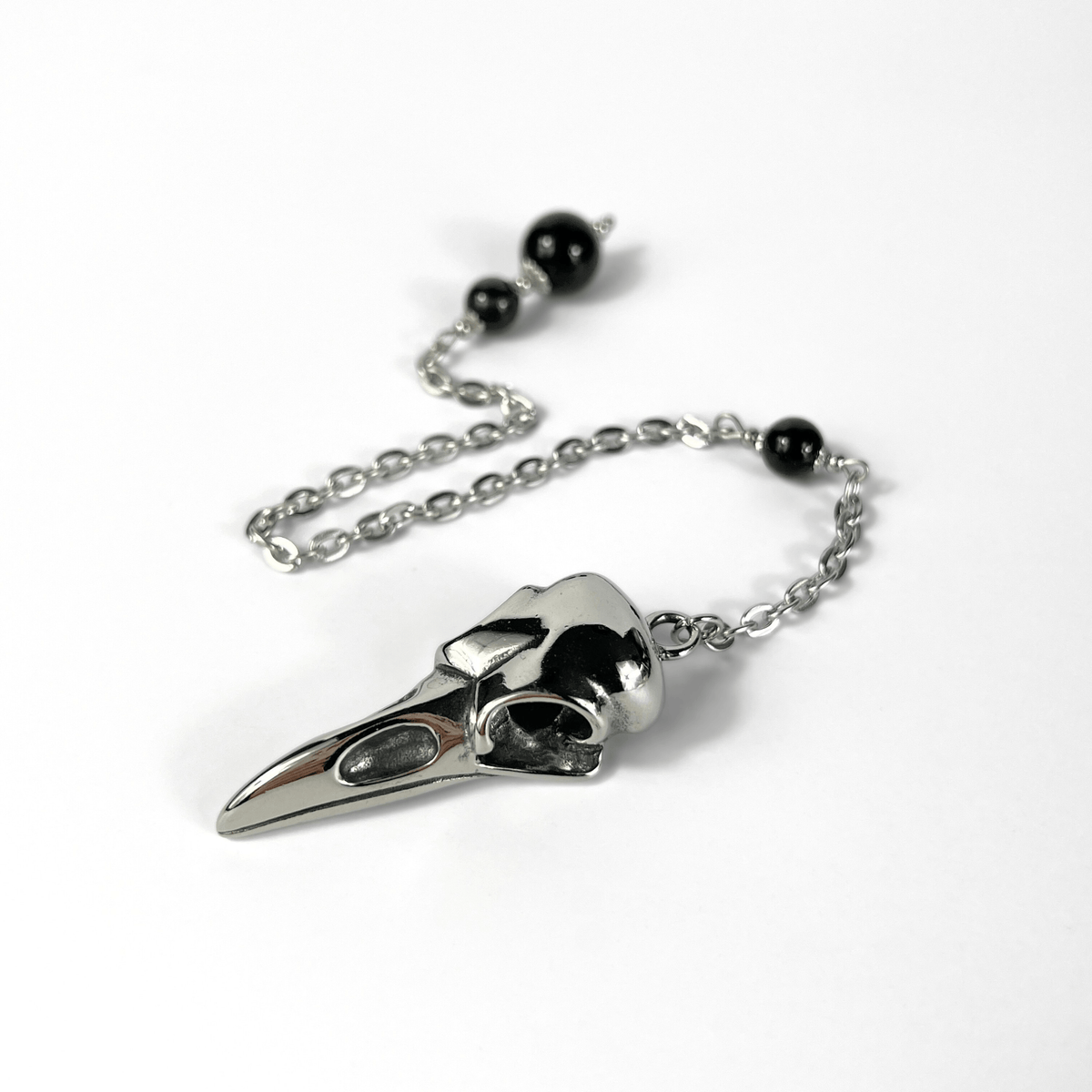 Raven skull and obsidian dowsing pendulum, stainless steel Baguette Magick
