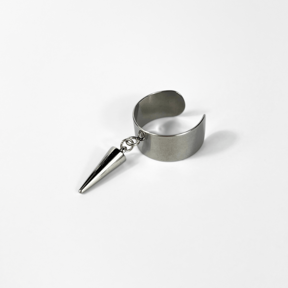 Sleek spikes or chain rings, polished stainless steel avant-garde jewelry Baguette Magick