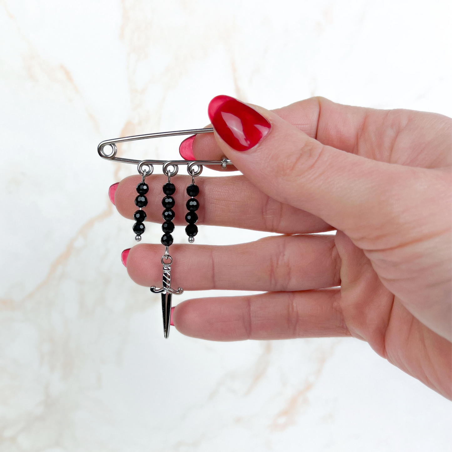 Kilt pin brooch adorned with gemstones, crystal, charms Baguette Magick
