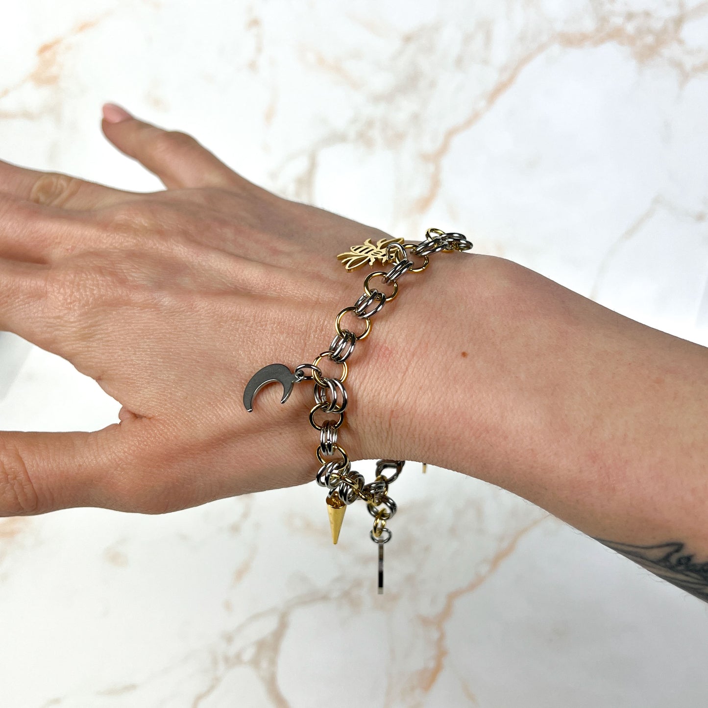 Chainmail charm bracelet, gold and silver tone, stainless steel and 18k gold plated Baguette Magick