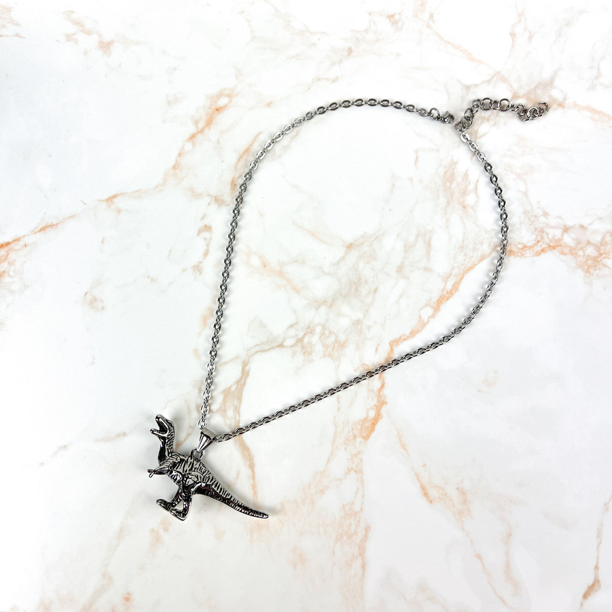 Raptor dinosaur necklace, stainless steel Baguette Magick