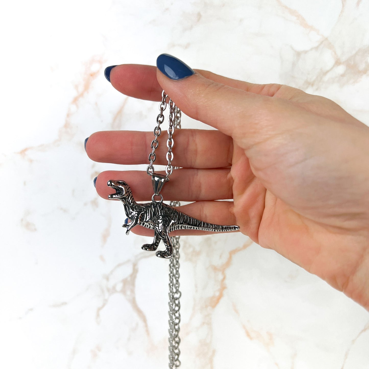 Raptor dinosaur necklace, stainless steel Baguette Magick