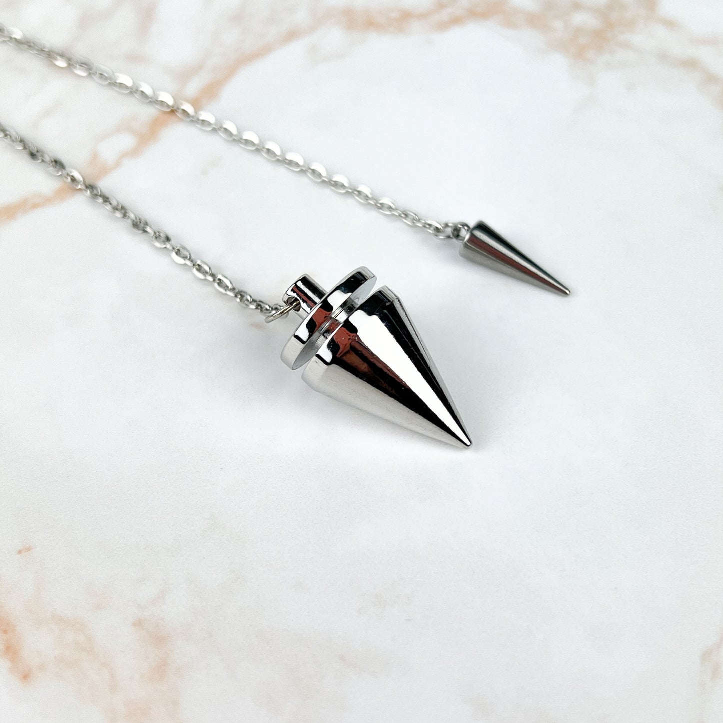 Cone and coil classic dowsing metal pendulum with a spike charm Baguette Magick