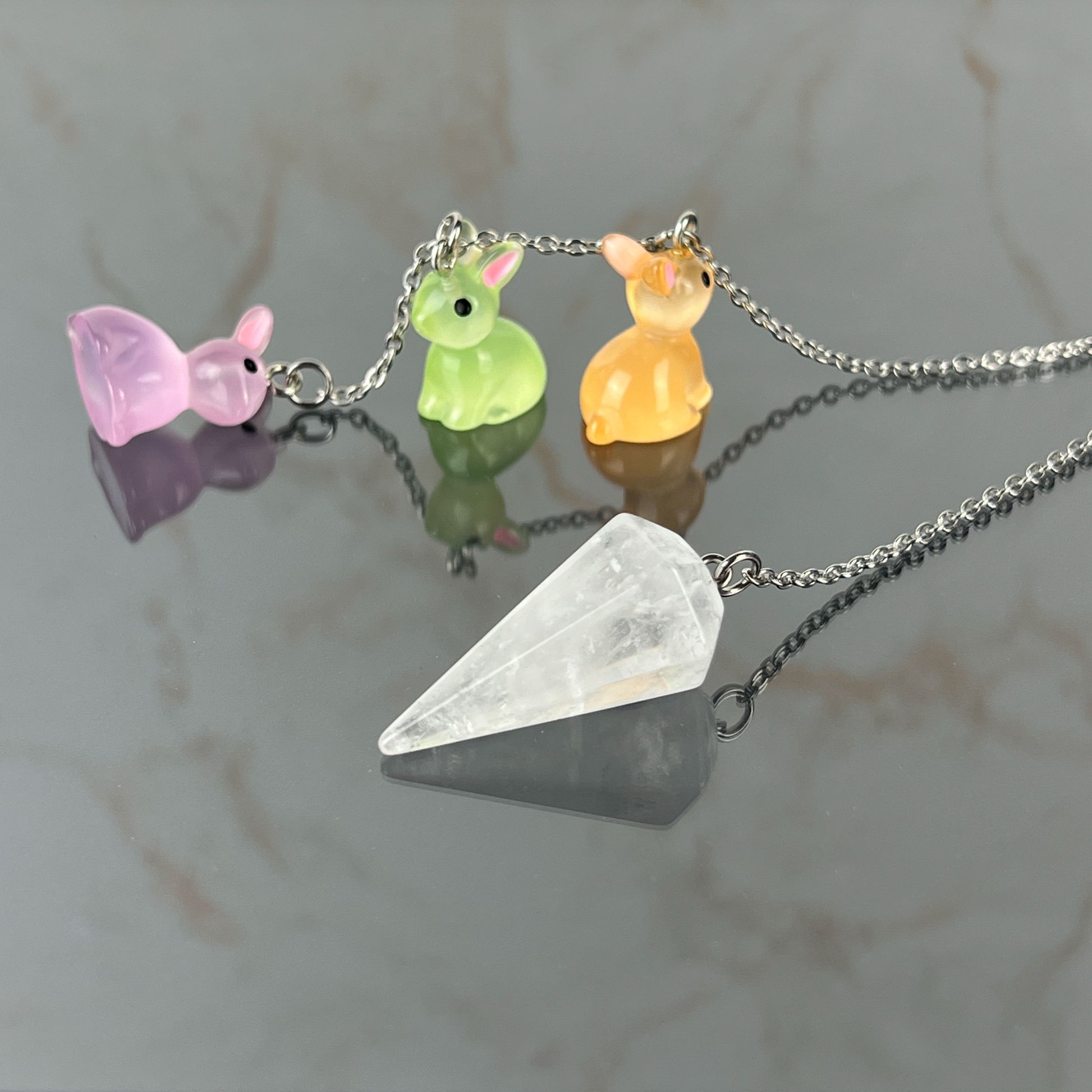 Easter bunnies clear quartz pendulum, stainless steel Baguette Magick
