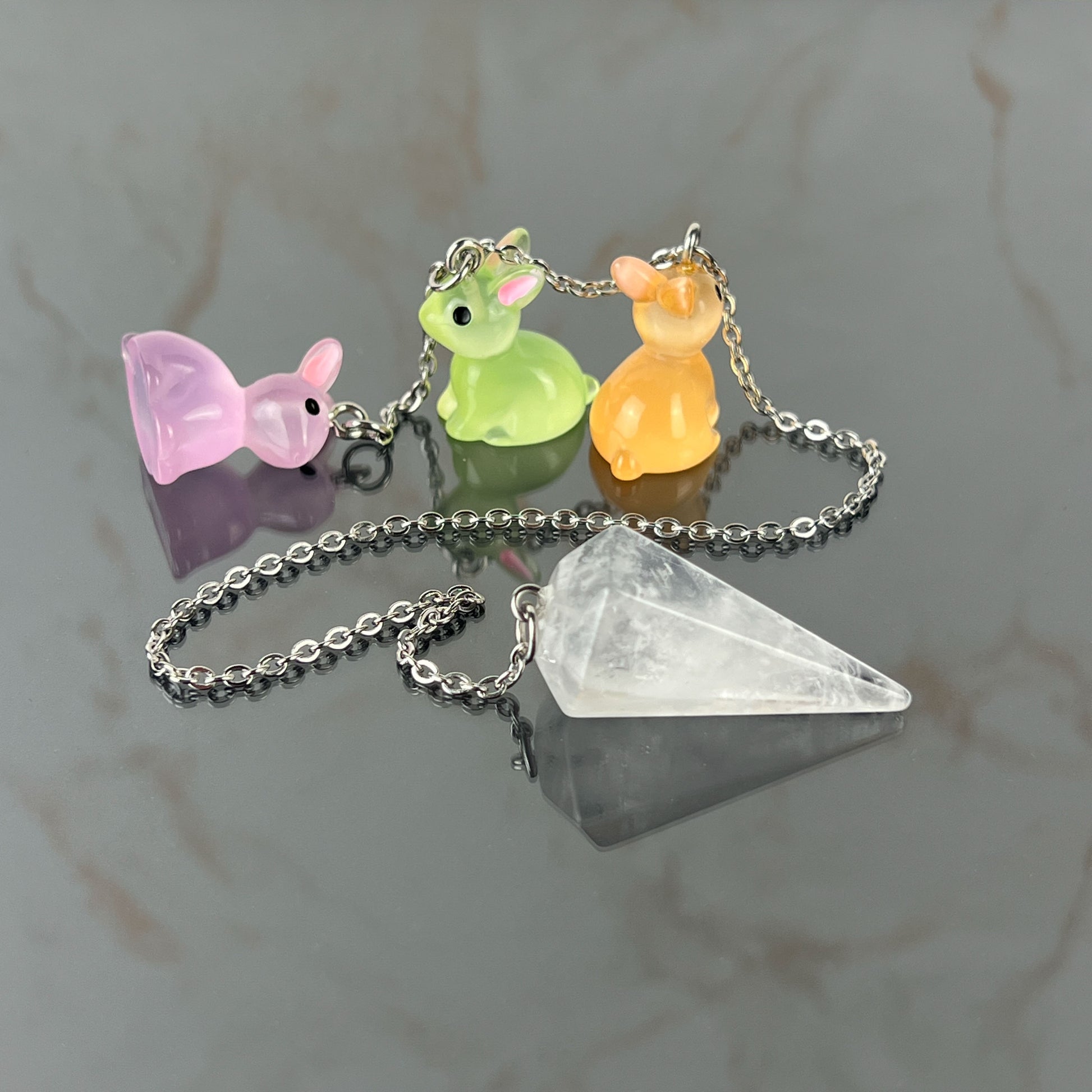 Easter bunnies clear quartz pendulum, stainless steel Baguette Magick