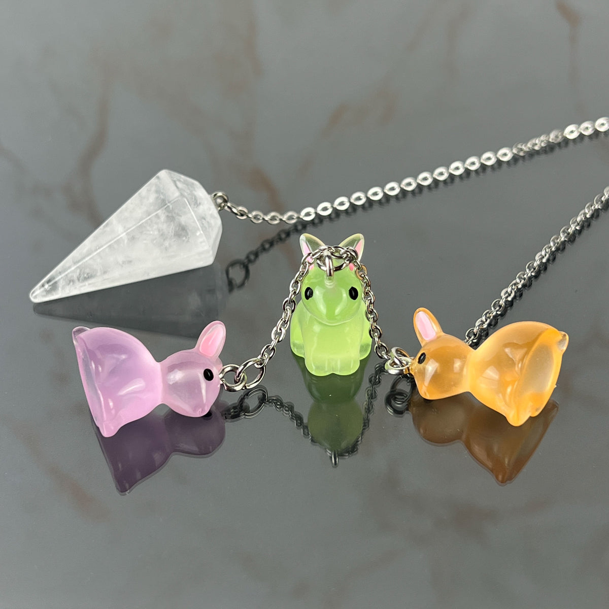 Easter bunnies clear quartz pendulum, stainless steel Baguette Magick
