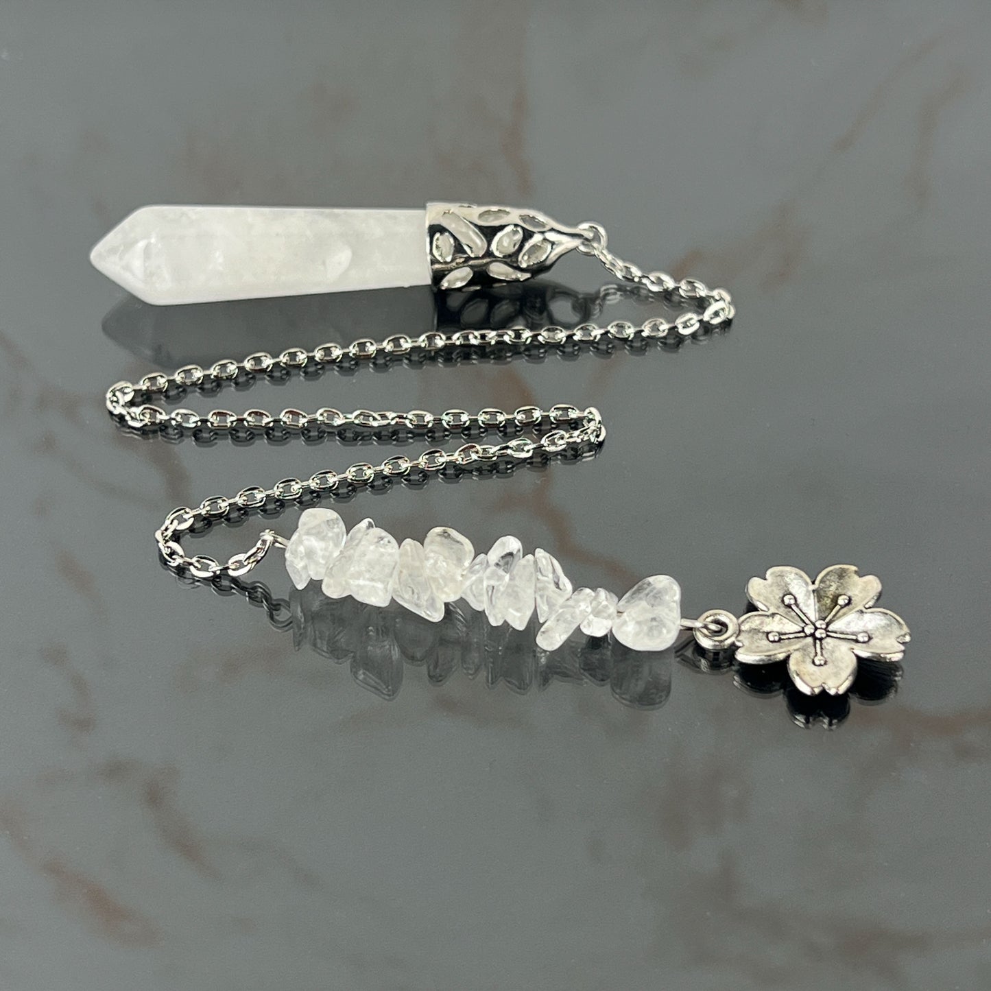 Clear quartz and flower divination pendulum Baguette Magick