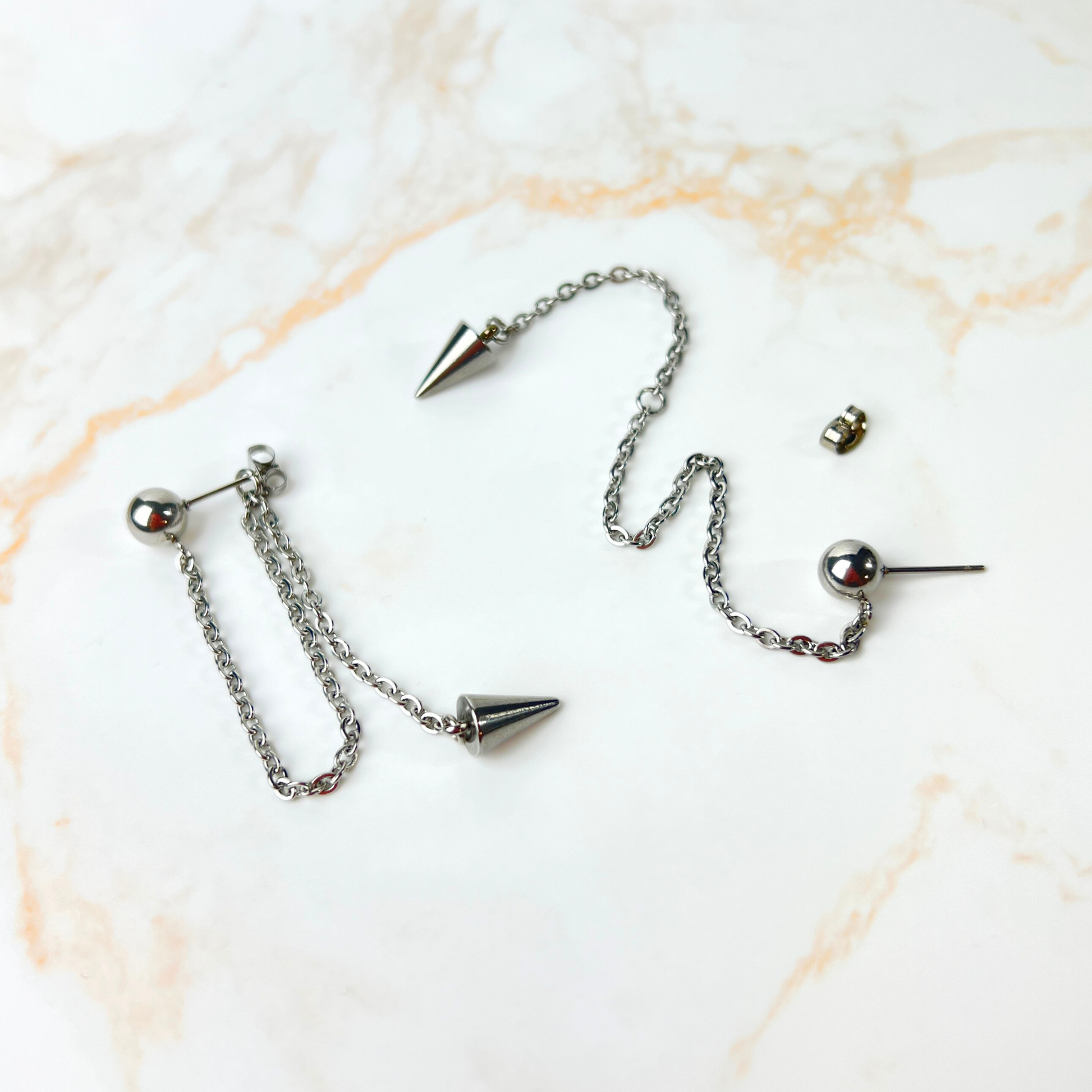 Secret pendulum earrings stainless steel spike and chains Baguette Magick