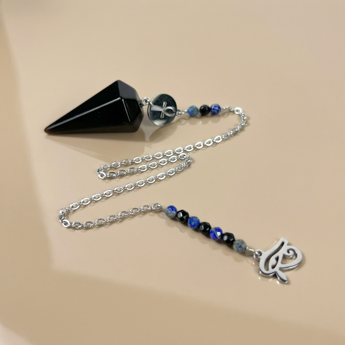 Pendule de divination avec obsidienne, lapis-lazuli, onyx, œil d'Horus et Ankh