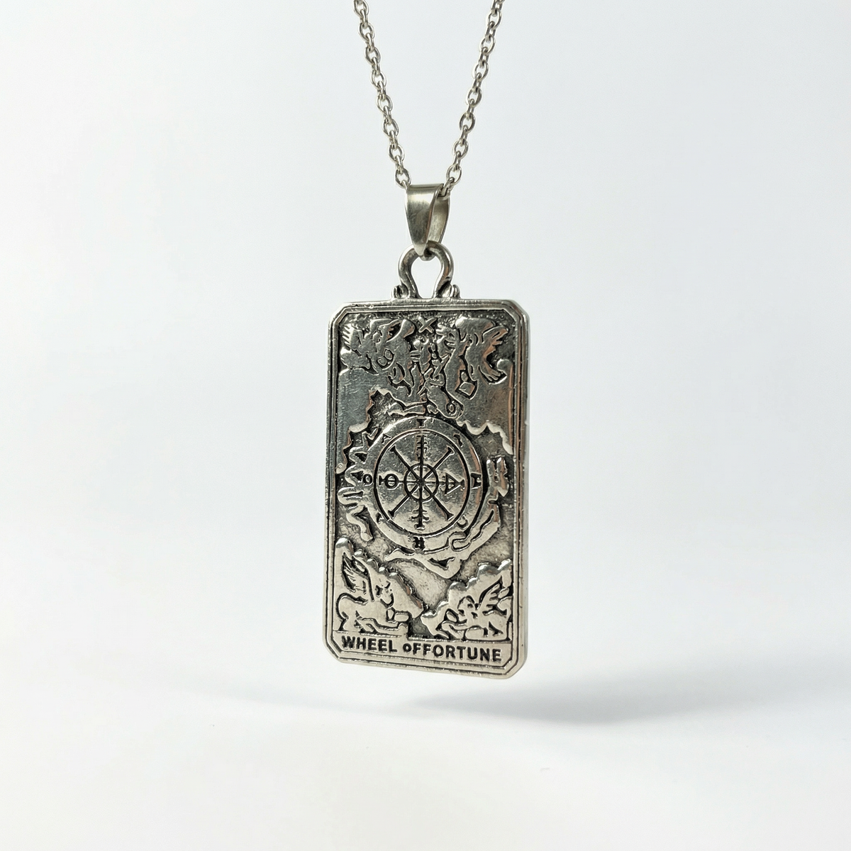 Wheel of fortune tarot arcana necklace with a reversible pendant