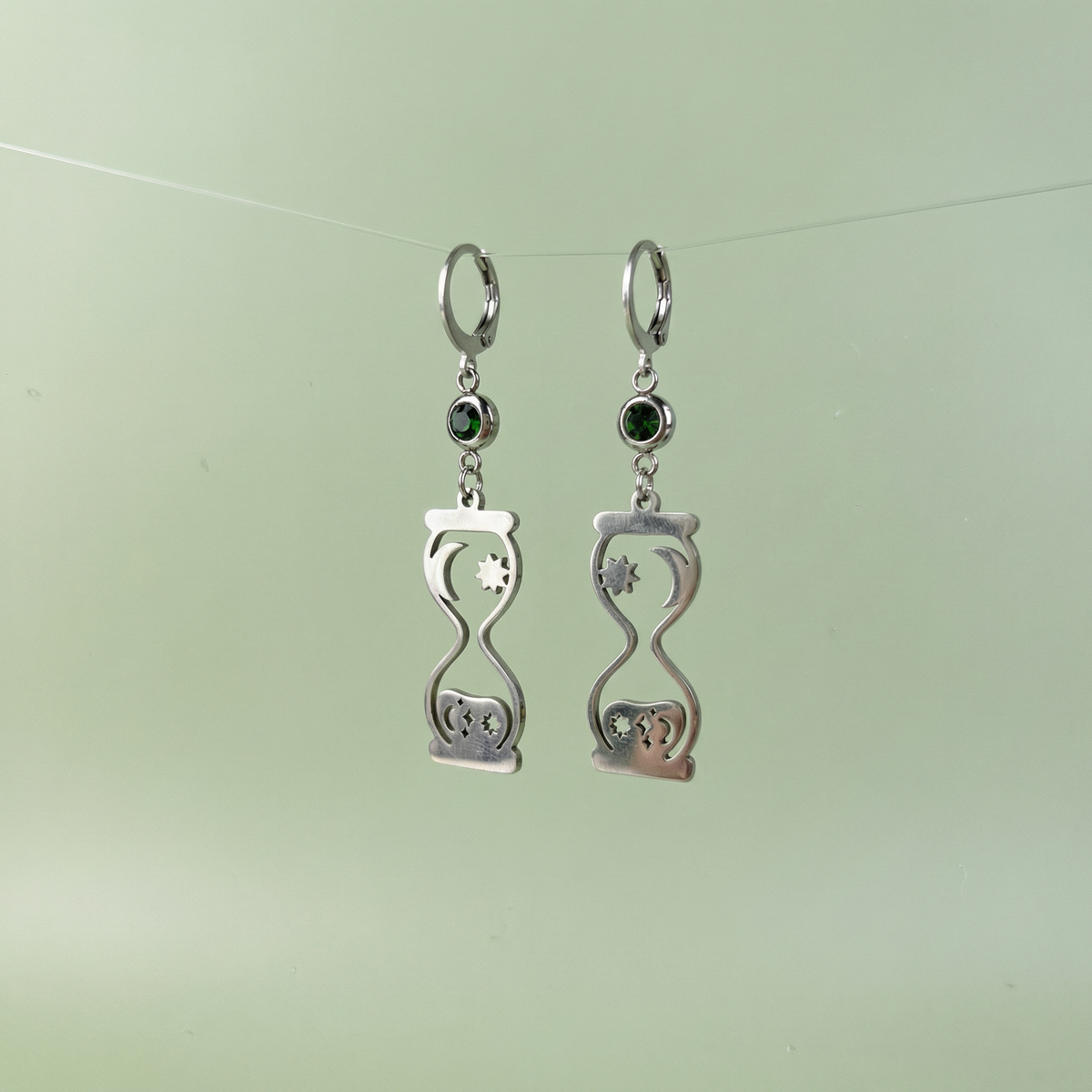 Celestial hourglass earrings with emerald green rhinestones Baguette Magick