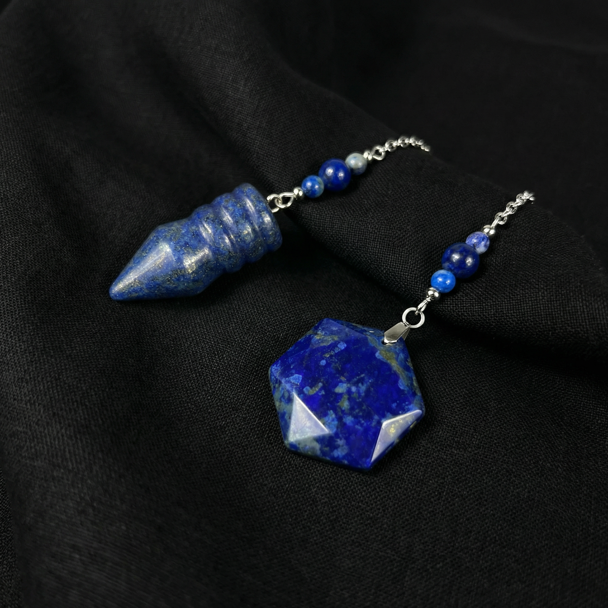 Bullet-shaped Lapis Lazuli pendulum, with a hexagonal gem