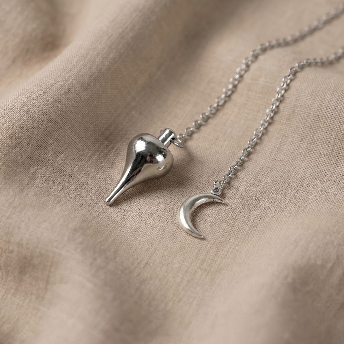 Luzi dowsing metal pendulum with a crescent Moon