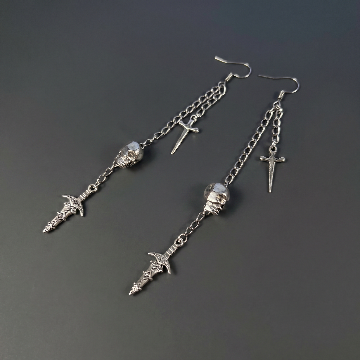 Skull and daggers dangle & drop earrings Baguette Magick
